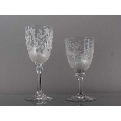 71 - A Continental wine glass with wheel engraved design of birds and monogram with coronet, 6.7