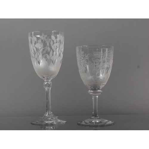 71 - A Continental wine glass with wheel engraved design of birds and monogram with coronet, 6.7