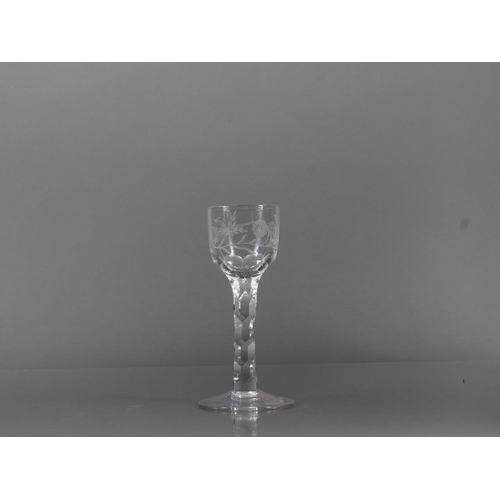 73 - A late 18th century cordial glass with bird and flower engraved bowl and faceted stem, 5.5