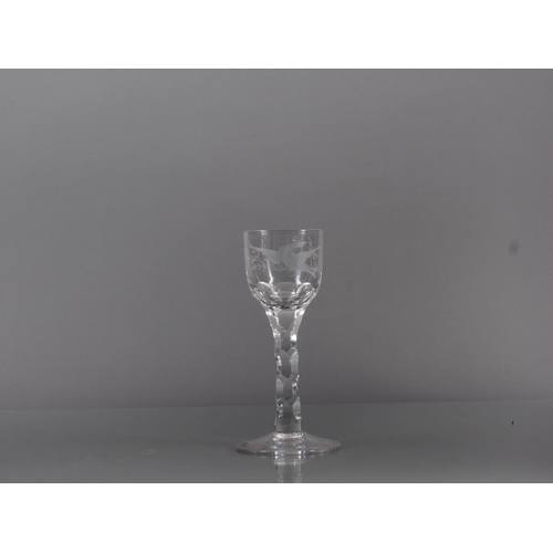 73 - A late 18th century cordial glass with bird and flower engraved bowl and faceted stem, 5.5