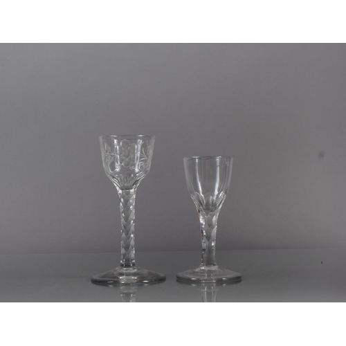 74 - A cordial glass with Jacobite rose and rose bird design, on faceted stem, 5.8