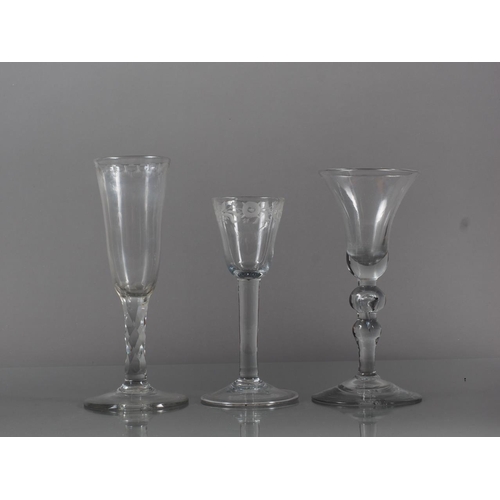 75 - An 18th century cordial glass with engraved bowl, plain stem and folded foot, 5.8