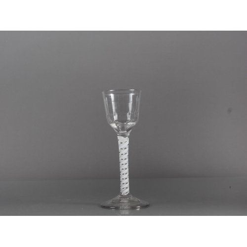 77 - A Georgian cordial glass with moulded bowl and double cotton twist stem, 5.9