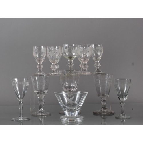 89 - A matched set of six liqueur glasses with floral engraved designs, two ports and other engraved glas... 