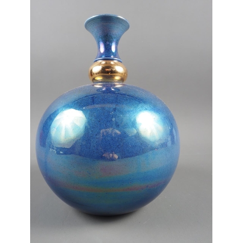 12 - A Tobias Harrison blue lustre bulbous vase, 9