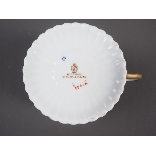 15 - A Davenport Imari decorated solo breakfast teaset (saucer repaired), a similar Davenport plate and a... 