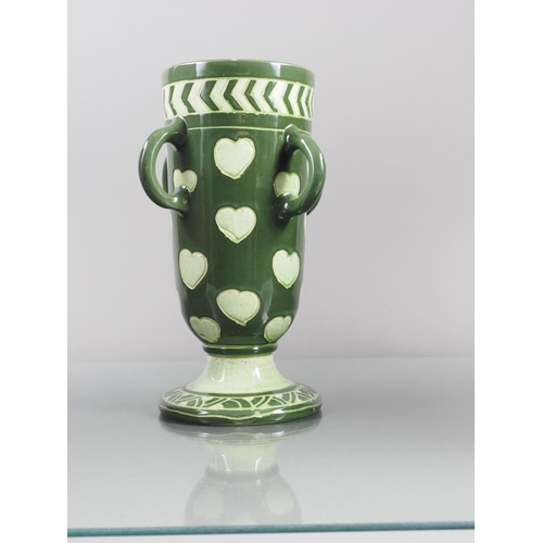 26 - Frederick Hurten Rhead four-handled green slip decorated and incised vase, 9