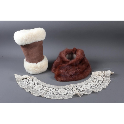 204 - A collection of lace collars and lace edge pieces, a sheepskin muff, a fur collar, etc