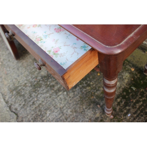 466 - A 19th century mahogany dressing table, fitted oval mirror over two drawers with knob handles, on tu... 