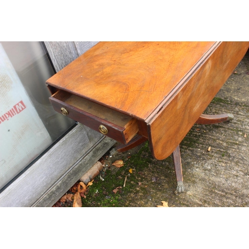 480 - A 19th mahogany Pembroke table, fitted one drawer with ring handles, on turned column and quadruple ... 