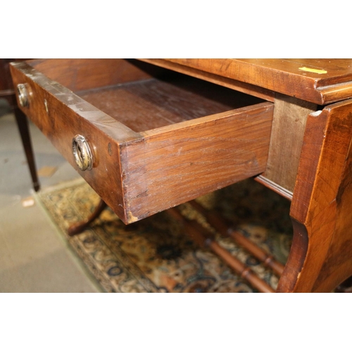 567 - A well reproduced walnut and banded sofa table, fitted two drawers, on twin spindle turned and stret... 