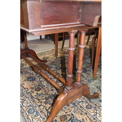 567 - A well reproduced walnut and banded sofa table, fitted two drawers, on twin spindle turned and stret... 