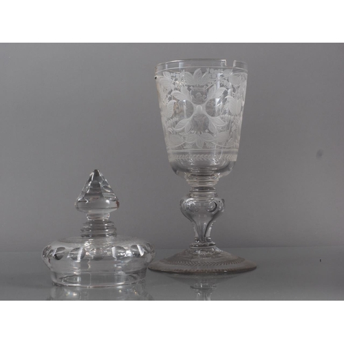 40 - An 18th century Continental wheel engraved goblet and cover, amorini and floral design blown faceted... 