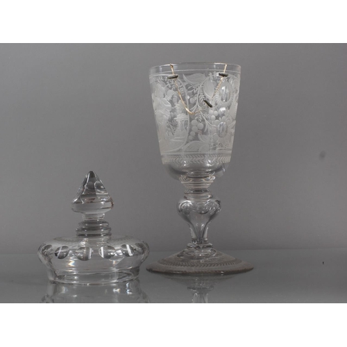 40 - An 18th century Continental wheel engraved goblet and cover, amorini and floral design blown faceted... 