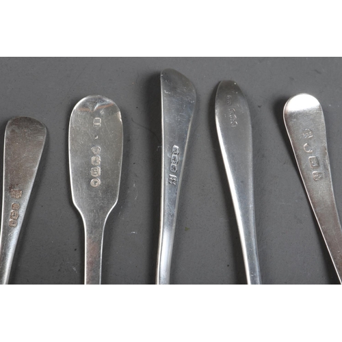 281 - Three sets of six silver teaspoons, four other silver teaspoons, two butter knives and a pair of sil... 