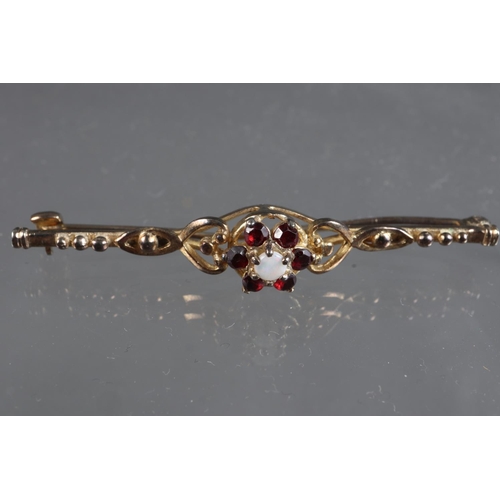 307 - Two early 20th century 9ct gold bar brooches, one set sapphire and seed pearls, one garnets and milk... 