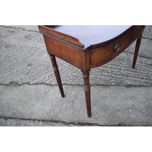 441 - A 19th century  break bowfront  tray top washstand, fitted one drawer with ring handles, on turned s... 