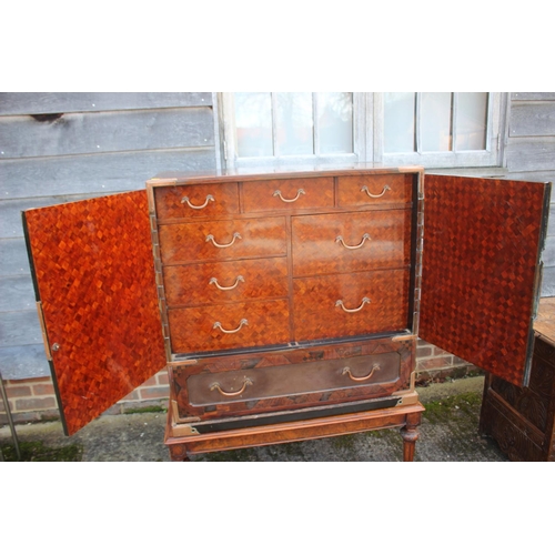 447 - A late 19th century Japanese parquetry cabinet, the interior fitted three small, three medium and tw... 