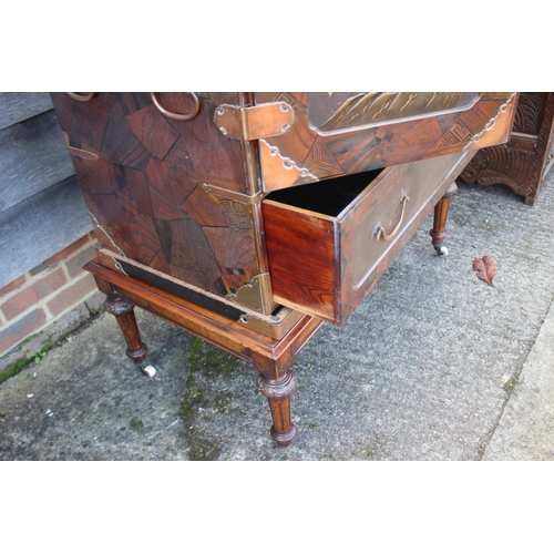 447 - A late 19th century Japanese parquetry cabinet, the interior fitted three small, three medium and tw... 