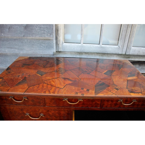 447 - A late 19th century Japanese parquetry cabinet, the interior fitted three small, three medium and tw... 