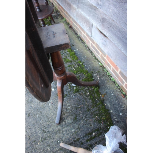 460 - A 19th century provincial oak tilt top table, on turned column and tripod splay support, 32