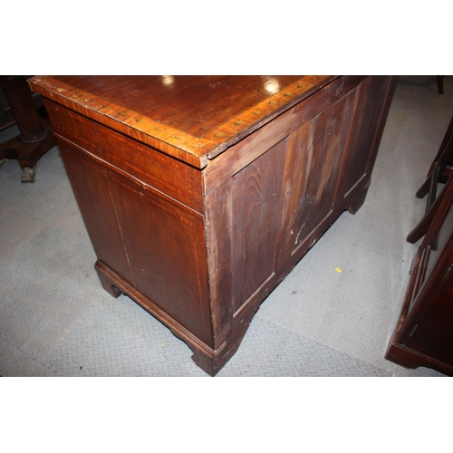 486 - A Sheraton Revival mahogany, satinwood banded and painted bowfront kneehole desk, fitted eight drawe... 