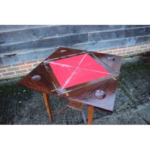 493 - A late 19th century rosewood and inlaid envelope top card table, on square taper supports, 19 1/2