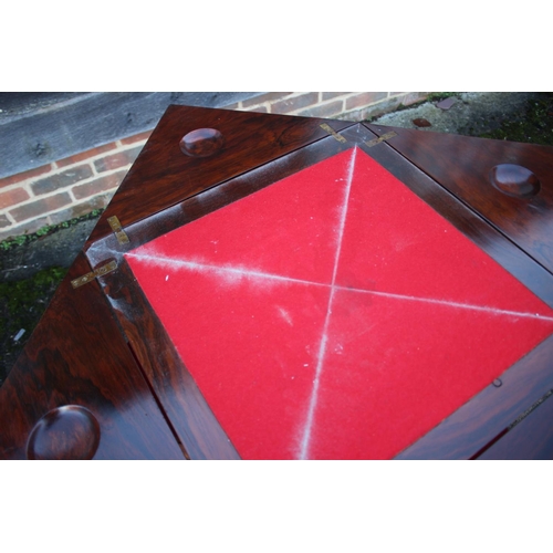 493 - A late 19th century rosewood and inlaid envelope top card table, on square taper supports, 19 1/2