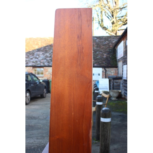 520 - A 1970s Heals teak bureau bookcase, the upper section with shelves over fitted compartment with tamb... 