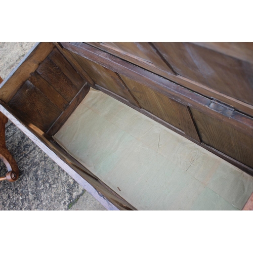 539 - A panelled oak coffer of 17th century design with arcaded and panelled front, 41