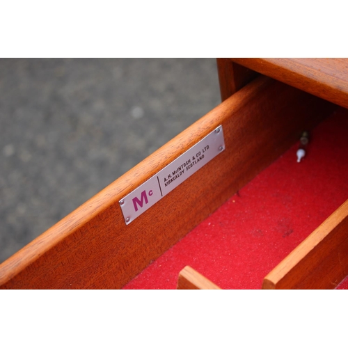 577 - An A H McIntosh & Co Ltd 1970s teak sideboard, fitted three drawers, two cupboards and drop-down... 