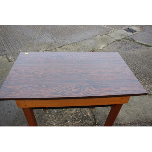 581 - A rosewood effect laminate top two-tier occasional table, 34 1/2