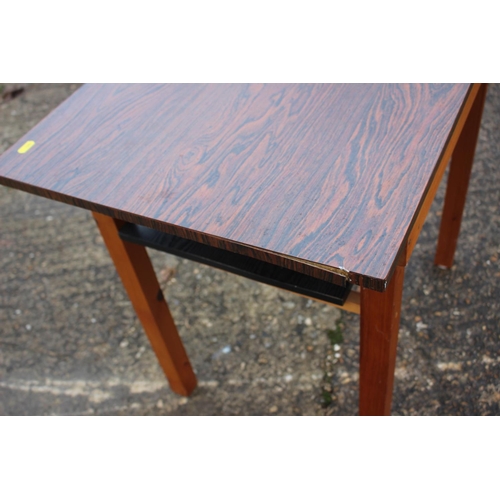 581 - A rosewood effect laminate top two-tier occasional table, 34 1/2