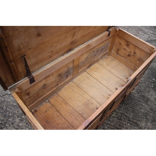 597 - An 18th century waxed pine triple panel front mule chest fitted three drawers, on stile supports, 43... 