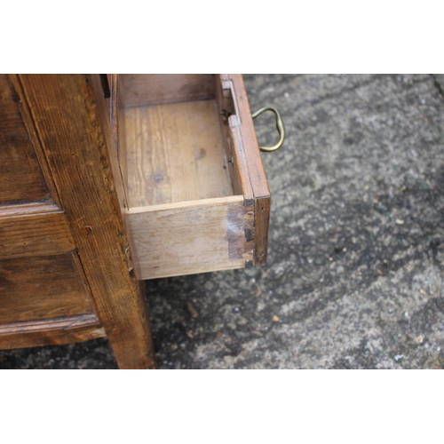 597 - An 18th century waxed pine triple panel front mule chest fitted three drawers, on stile supports, 43... 