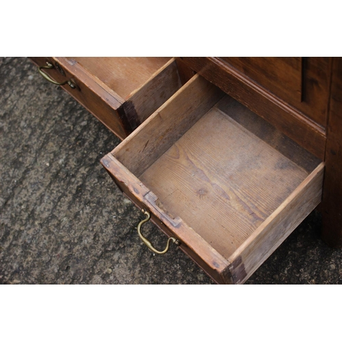 597 - An 18th century waxed pine triple panel front mule chest fitted three drawers, on stile supports, 43... 