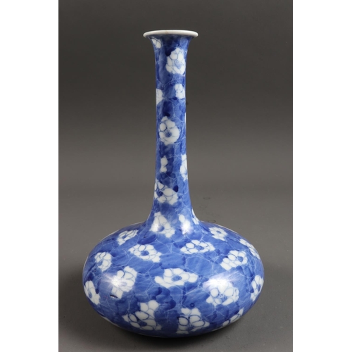 97 - A Chinese blue and white onion vase with prunus decoration, 8 1/2