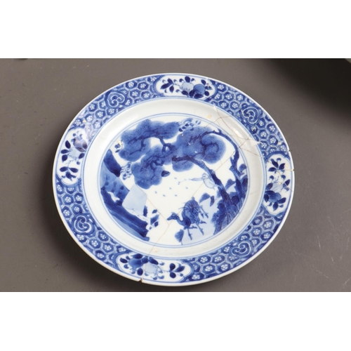 98 - A Chinese blue and white dish with panelled floral decoration and double mark ring to base, 11 1/4