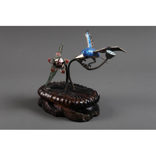 285 - A Chinese silver filigree and enamelled model of a kingfisher with lotus leaf and blossoms, on hardw... 