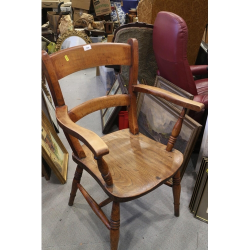 544 - A Windsor lath back farmhouse elbow chair with elm panel seat and a similar bar back elbow chair, on... 