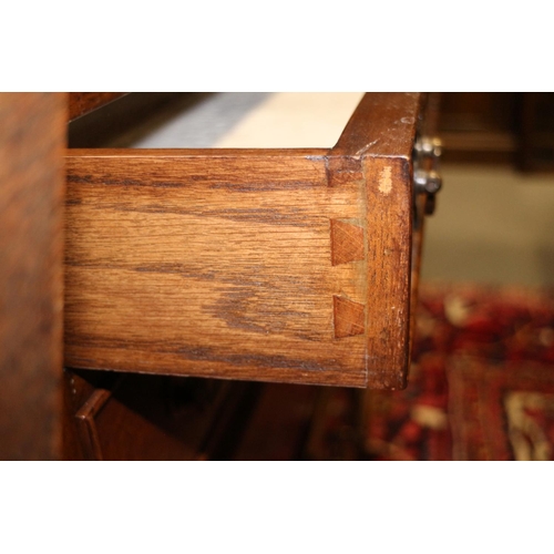 572 - A pair of bachelors' walnut and banded chests of four drawers, on bracket feet, 24