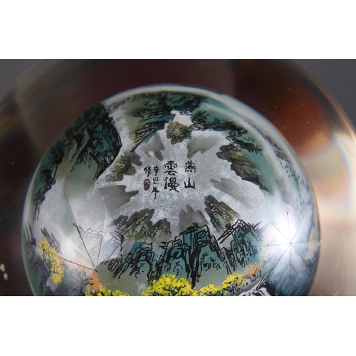 110 - A Chinese interior painted paperweight with matched stand, a quantity of enamelled and polychrome de... 