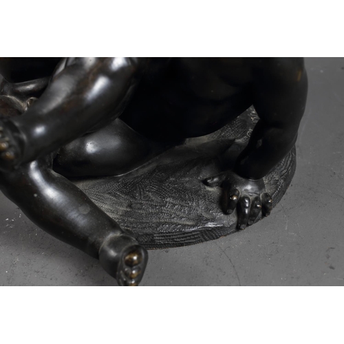 160 - Clodion: a 19th century patinated bronze group of two putti wrestling a swan, 11