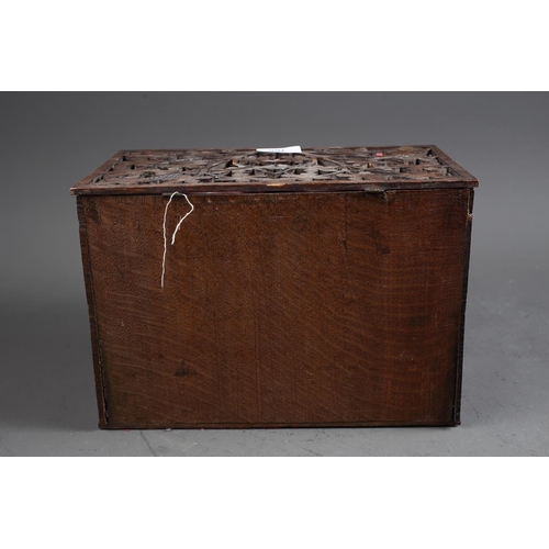 166 - A late 19th century oak fretwork slope top box, 11