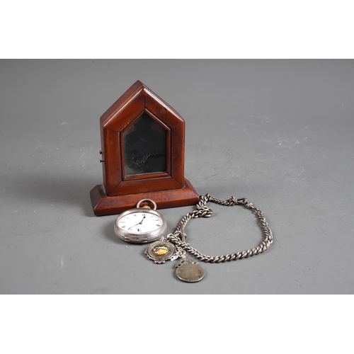 330 - An engine turned silver cased pocket watch and chain with two fobs, 2.8oz troy, and a mahogany Gothi... 