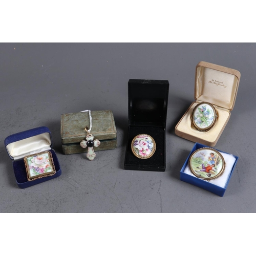 210 - A Limoges enamelled crucifix, reverse signed Camille Faure, and four Limoges porcelain brooches, var... 