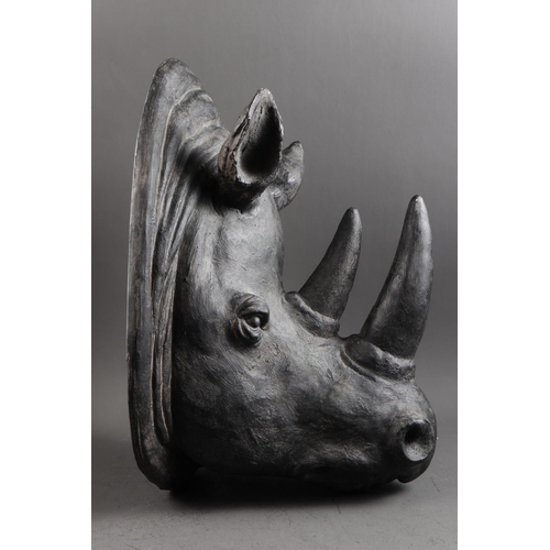 218 - A composition wall hanging, formed as a rhinoceros head, 16 1/2