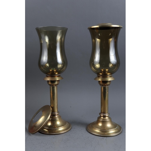 232 - A pair of brass storm lanterns with amber colour shades, 15