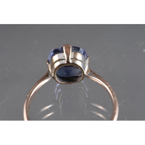 312 - A 9ct gold Ceylon sapphire solitaire ring, stone 10.4mm x 10.76mm x 6mm deep, size S