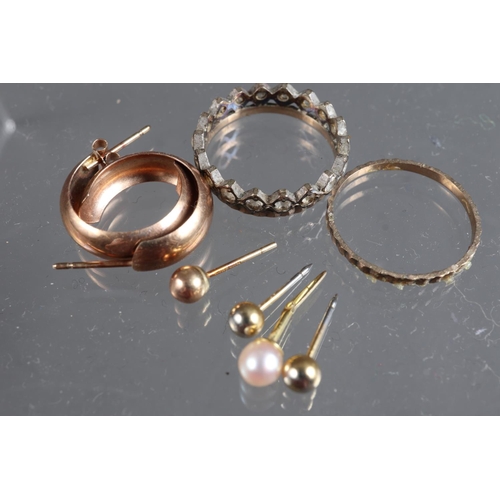 326 - A pair of 9ct gold earrings, 0.9g, four ear studs, and a 9ct ring, set white stones, 2.3g gross